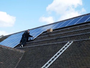 Solar panels being fitted to church roof